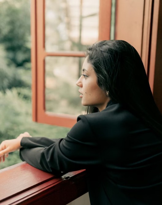 Woman reflecting during a major life transition